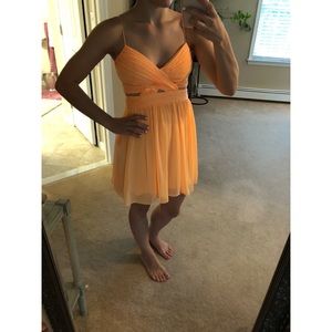 Peach dress with mesh cut outs